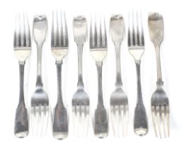 Eight various George III and later silver fiddle pattern dessert forks.