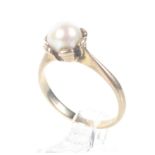 A vintage 9ct gold and cultured-pearl single stone ring.