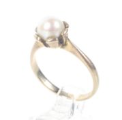 A vintage 9ct gold and cultured-pearl single stone ring.