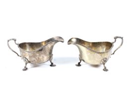A matched pair of silver sauce boats.