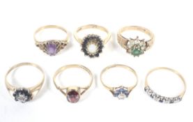 Seven vintage 9ct gold and gem-set rings.