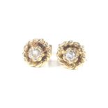 A pair of vintage 18ct gold and small diamond stud earrings. Each round brilliant approx. 0.