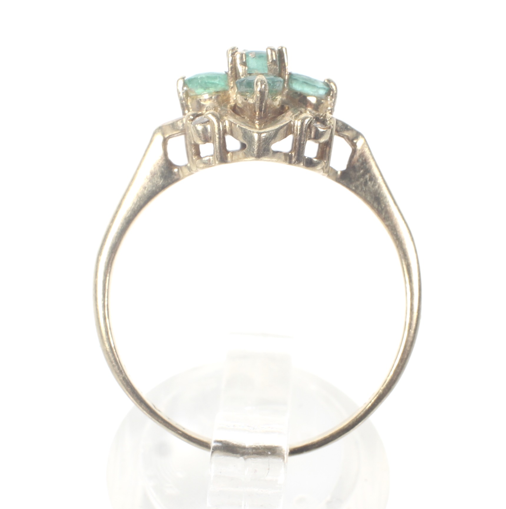 A modern 9ct gold, emerald and diamond cluster ring. - Image 3 of 4