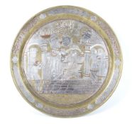 An unusual 19th century Persian silver and copper inlay brass charger.