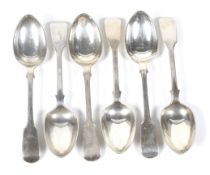A set of six Victorian silver fiddle pattern dessert spoons.