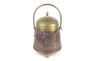 A Dutch style brass and copper bin.