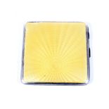 A silver and yellow guilloche enamelled square cigarette case.