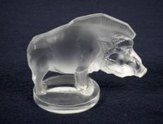 Lalique, Paris: a clear embossed frosted glass image of a boar.