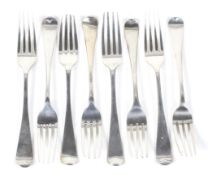 Eight various George III and later silver old English pattern table forks.