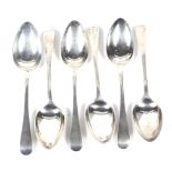 A set of six George III silver old English pattern table spoons.