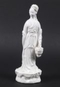 A 20th century Chinese blanc de chine figure of Guanyin.
