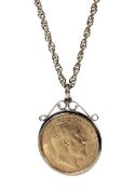 A Sovereign, 1910, loosely mounted in a plain 9ct gold pendant mount.