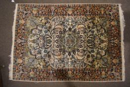 An early to mid-20th century silk hand stitched rug.