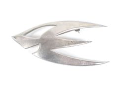 Rasmussen & Lassen, a Danish modernist 'Sterling' brooch of abstract bird design.