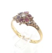 An early Victorian 22ct gold, ruby and half-pearl cluster ring.