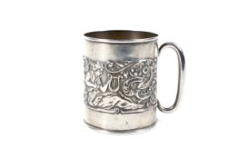 A silver small can-shaped christening mug.