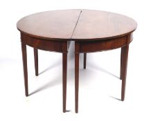 A pair of Georgian mahogany D-end tables that make useful consul/pier tables.