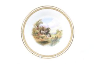 A Royal Worcester plate with impressed mark. Hand painted scene of donkeys and gilded rim, 22.