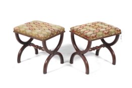 A pair of Victorian mahogany x framed stools with over stuffed seats and turned stretchers, each 39.