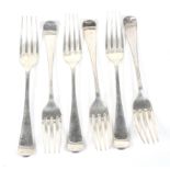 A set of six silver old English pattern table forks.