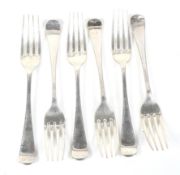 A set of six silver old English pattern table forks.