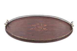 An Edwardian mahogany tray. With pierced metal gallery and inlaid with a bouquet of flowers. L67cm.