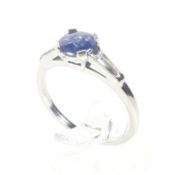 A 1920's platinum, sapphire and diamond ring.