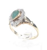 A vintage 9ct gold, emerald and diamond pear-shaped cluster ring.
