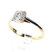An early 20th century gold and diamond square cluster ring, circa 1925.
