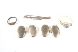 A pair of vintage 9ct gold oval twin-panel cufflinks and other items.