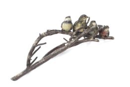 Cold painted bronze - A 19th century figure group depicting various birds sitting on a branch.
