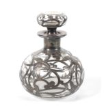 An Art Nouveau mounted clear glass scent bottle.