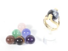 A vintage 18ct gold and multi-gem interchangeable beads ring.