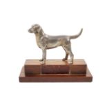 A silver model of a labrador.