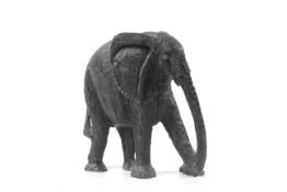 A 19th century carved wooden elephant. approximately 32.