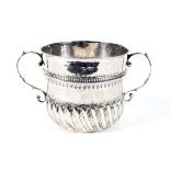 A William III silver porringer.