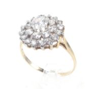 A vintage 9ct gold and cubic zirconia cluster ring.