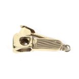 A 9ct gold mounted brass cigar cutter.