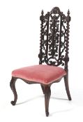 A Victorian mahogany oak stuffed chair