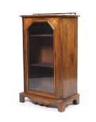 Victorian inlaid walnut music cabinet with brass gallery to top and fully glazed door.