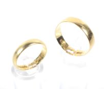 Two 22ct gold wedding bands.