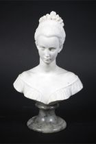 A Gamellis reconstituted marble bust of a young lady.