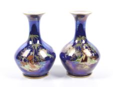 Carlton Ware Persian : A pair of baluster shaped vases in iridescent blue.