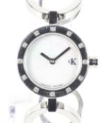 Calvin Klein, a lady's stainless steel and diamond bracelet watch, circa 2004. ref.