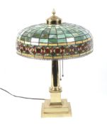 Tiffany style: A 1922 gilded table lamp.