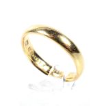 An early 20th century 22ct gold D-section wedding band. Hallmarks for Birmingham 1922, 3.