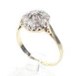 A mid-20th century 18ct gold and diamond cluster ring.