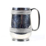 A Victorian silver pint mug.