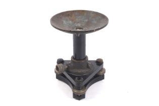 An ER Watts & Sons surveyor's levelling stand. WIth a spirit level in a rounded dish.