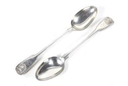 A pair of George IV silver fiddle, thread and shell serving spoons.